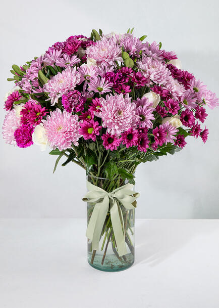 Arreglo de Margaritas Moradas y Rosas