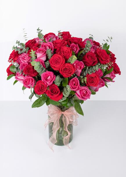 Arreglo de Rosas Rojas y Fucsia 